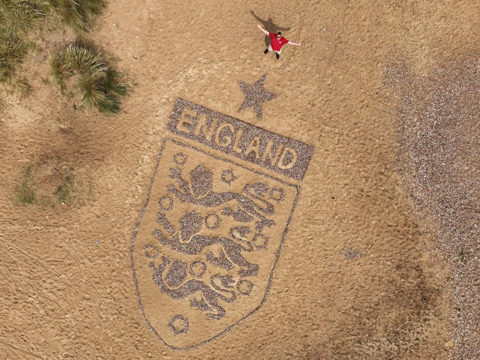 A Driver Ran Over a 30-Foot England Badge on a Beach — Then the Artist Fixed It Before Kickoff