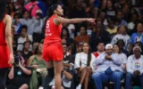Angel Reese Silenced a Courtside Heckler With a Clutch Three and a Phone Gesture