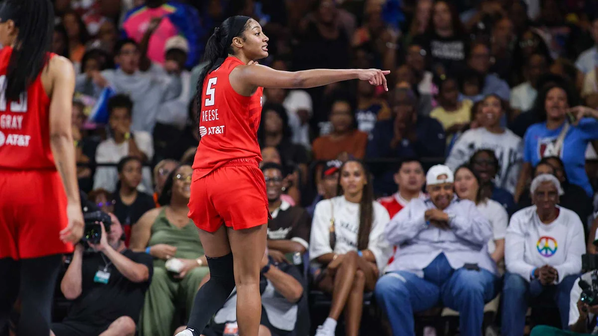 Angel Reese Silenced a Courtside Heckler With a Clutch Three and a Phone Gesture