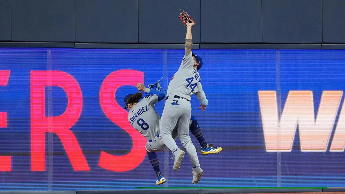 The Dodgers Are Giving Away a Bobblehead of Andy Pages’ Insane World Series Catch Over Teammate Kiké Hernandez