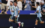 Messi Hoisted on Fernandez’s Shoulders After Argentina Shocks England in Extra Time