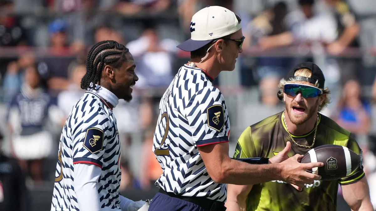 Tom Brady and Logan Paul Exchanged Middle Fingers at the World Cup Final and It Got Weird Fast