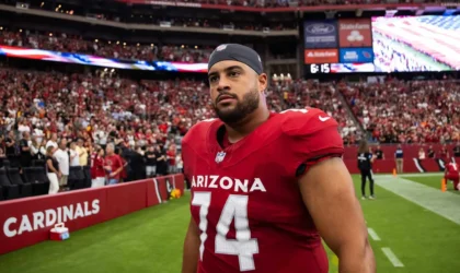 Cardinals OL Isaiah Adams Faces Gun Charges but Still Expected at Camp