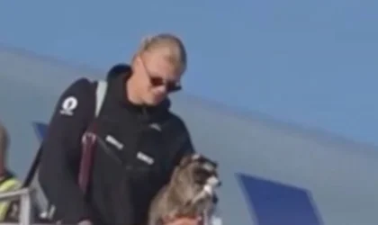 Erling Haaland Landed in Norway With a $750 Stuffed Raccoon Under His Arm